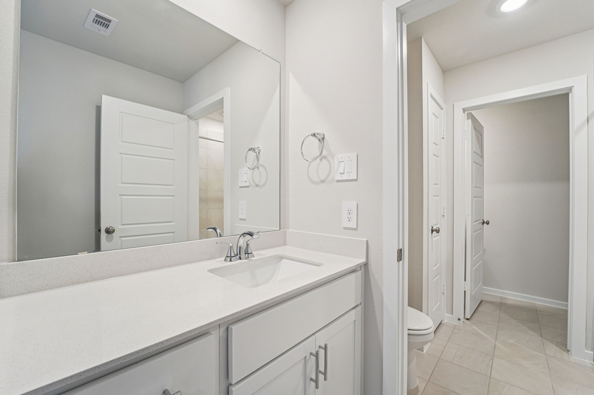 16217 Parish Pointe Court Conroe, TX 77302 - Photo 33 of 42 a bathroom with a sink and a mirror