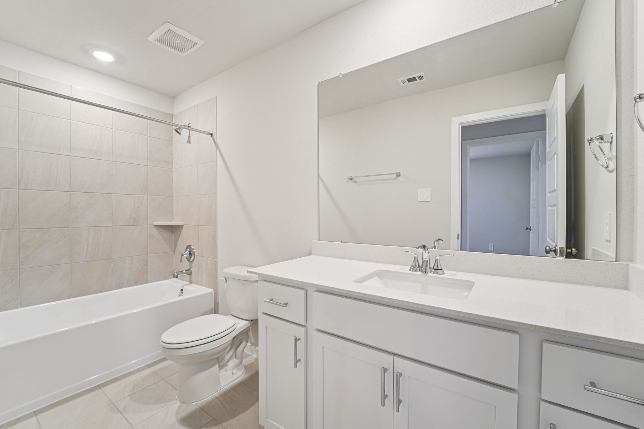 16217 Parish Pointe Court Conroe, TX 77302 - Photo 35 of 42 a bathroom with a sink a toilet and shower