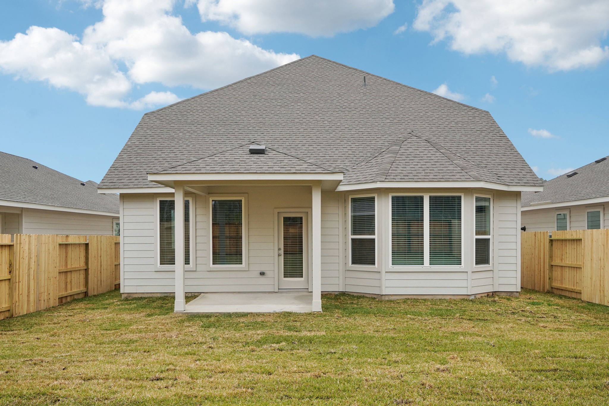 16217 Parish Pointe Court Conroe, TX 77302 - Photo 40 of 42 a house with swimming pool in front of it