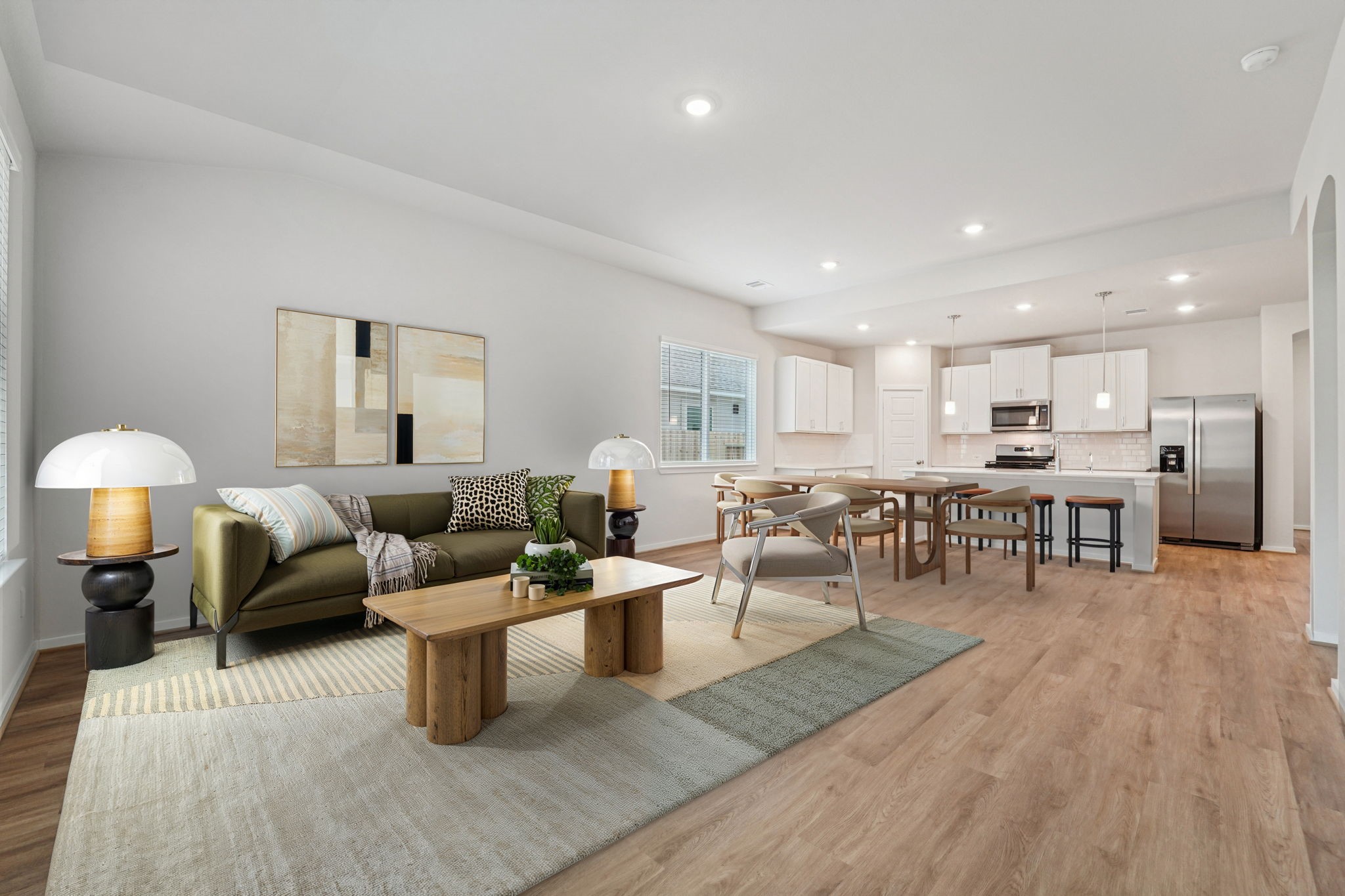 16217 Parish Pointe Court Conroe, TX 77302 - Photo 6 of 42 a living room with lots of furniture and a table