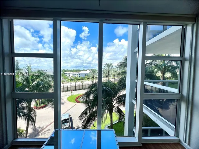 a view of swimming pool from a window