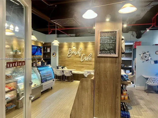 a living room with lots of furniture and wooden floor