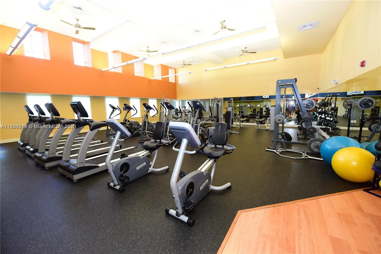 7355 Southwest 89th Street, Unit 622N Miami, FL 33156 - Photo 12 of 16 a view of a room with gym equipment