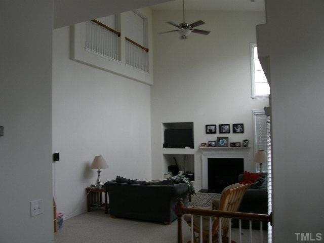 8 Drye Lane Durham, NC 27713 - Photo 3 of 9 a living room with furniture and a flat screen tv