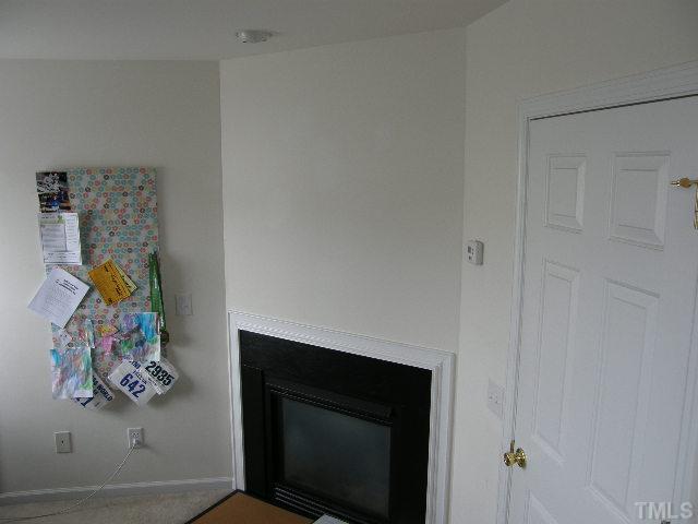 8 Drye Lane Durham, NC 27713 - Photo 8 of 9 a room with painting on the wall and a wall painting