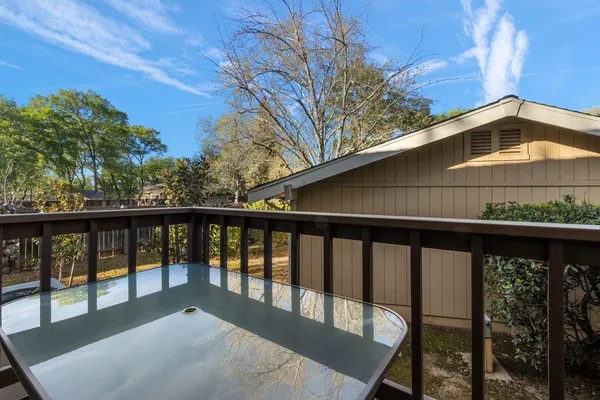 a view of a balcony with an outdoor space