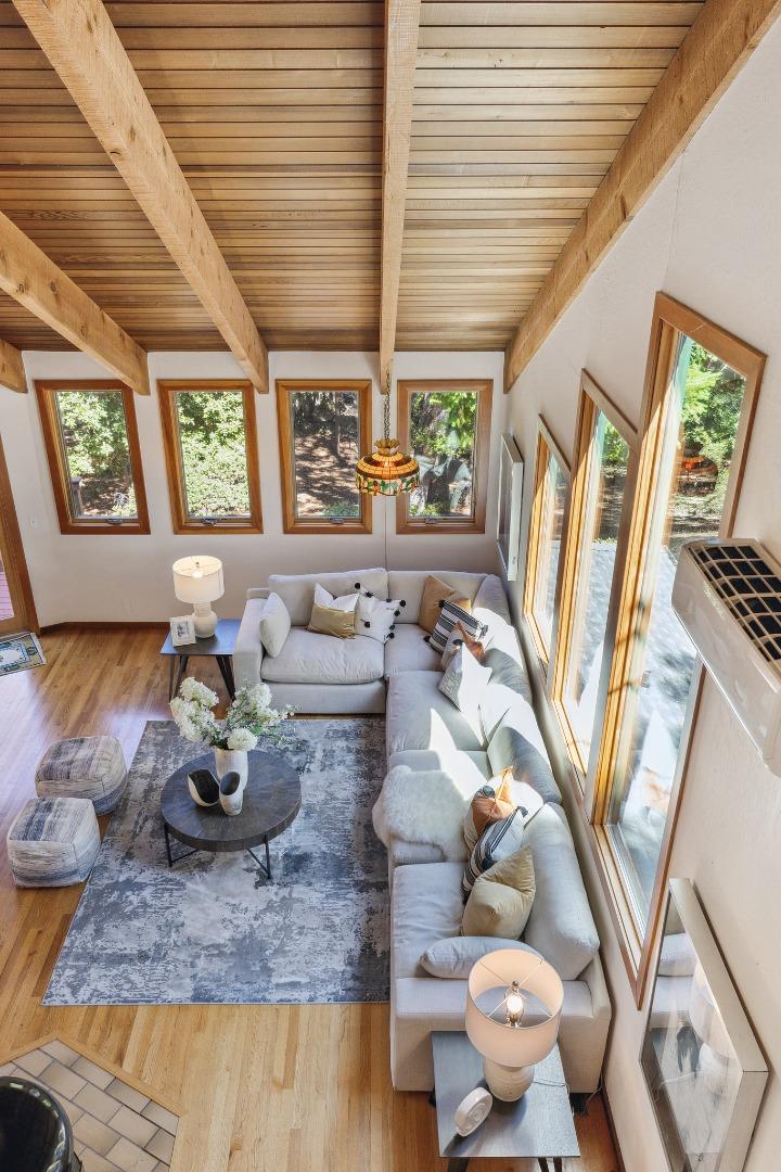 22114 Miller Ridge Road Los Gatos, CA 95033 - Photo 38 of 100 a living room with furniture and a large window