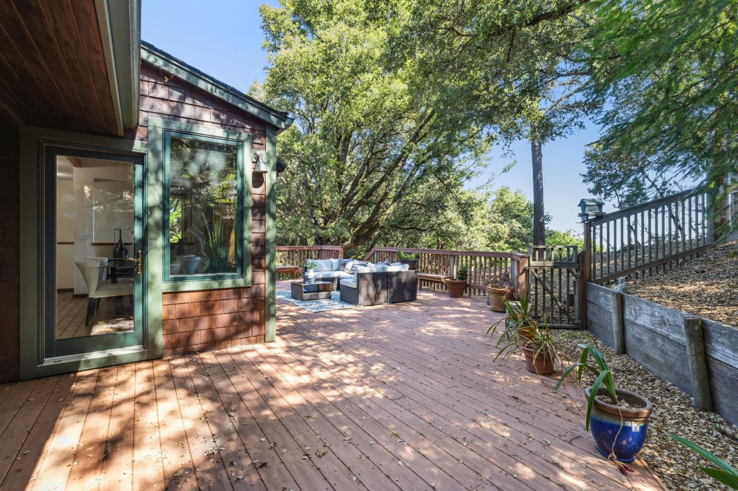 22114 Miller Ridge Road Los Gatos, CA 95033 - Photo 75 of 100 a view of a chairs with a patio