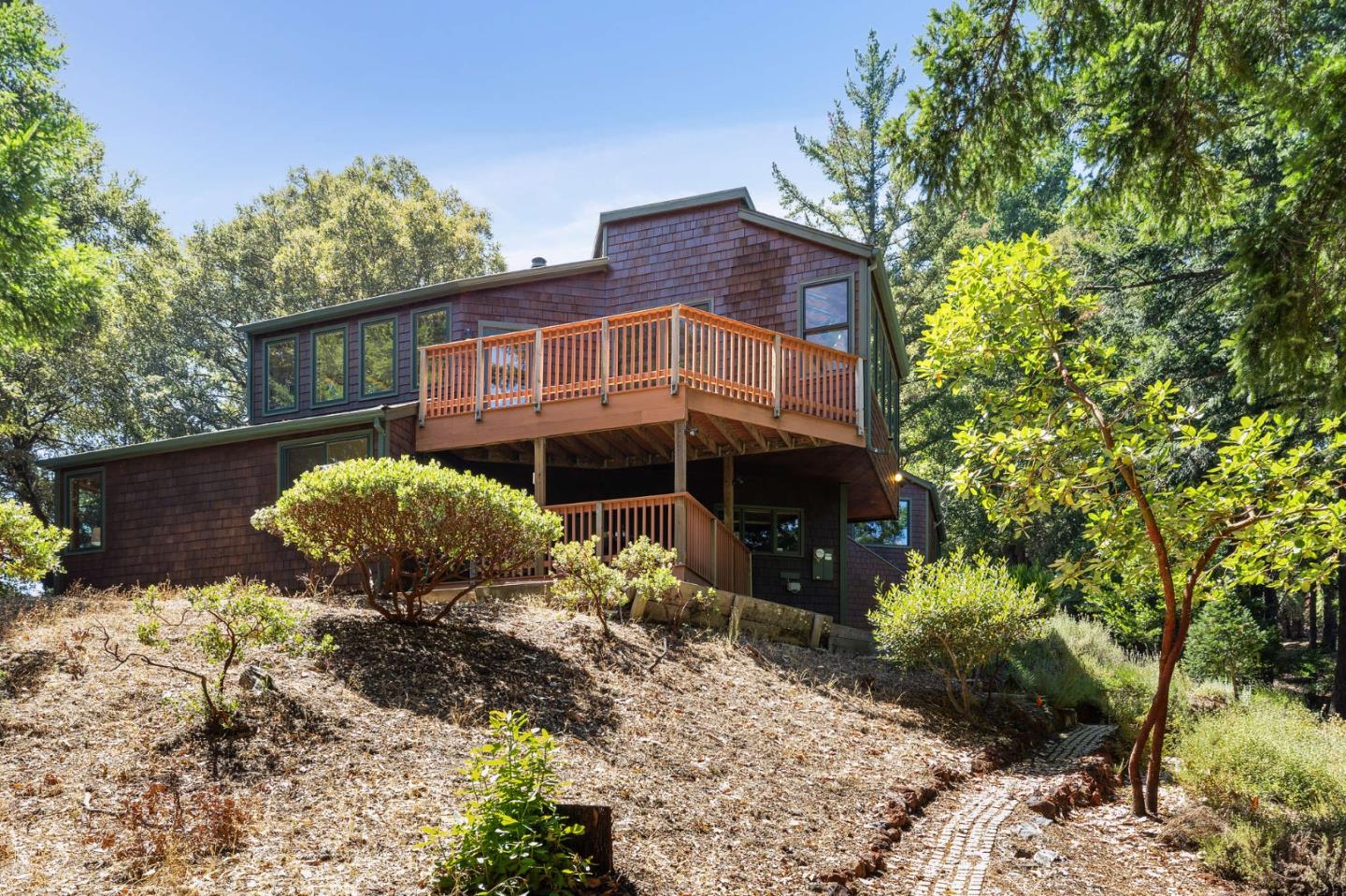 22114 Miller Ridge Road Los Gatos, CA 95033 - Photo 79 of 100 a front view of a house with a yard