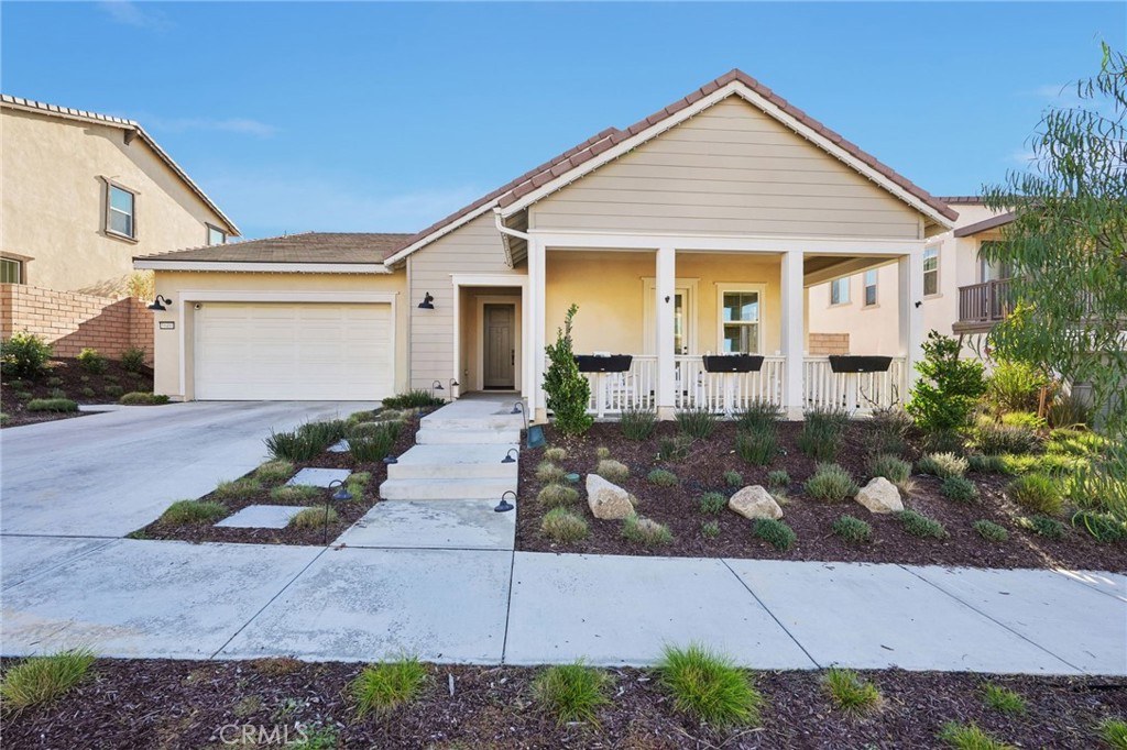 39481 Chamise Temecula, CA 92591 - Photo 1 of 34 front view of a house with a small yard