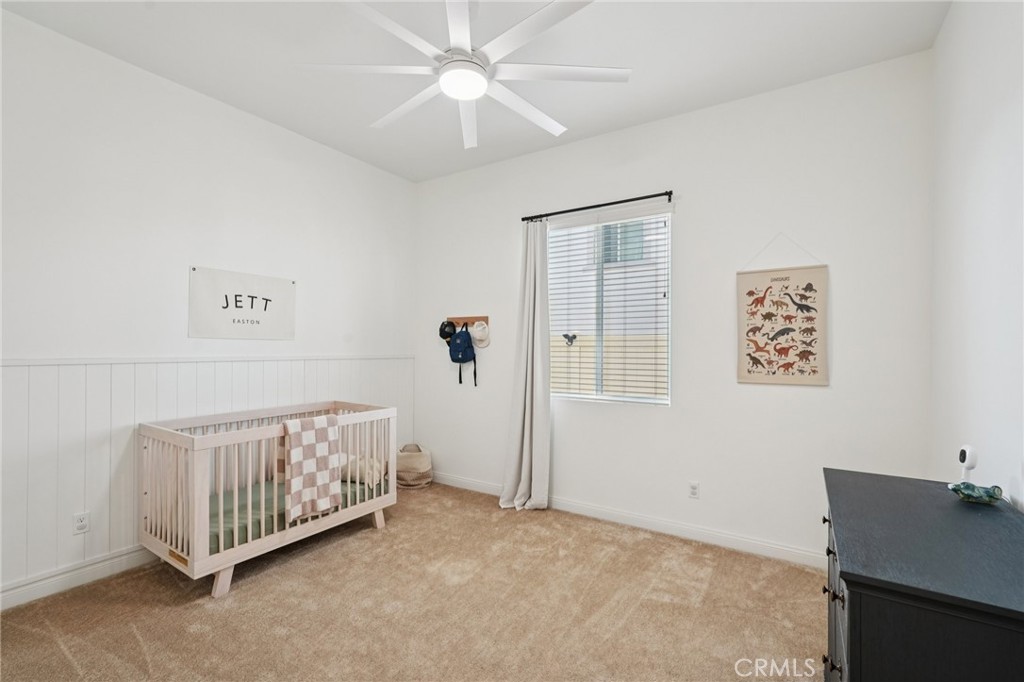 39481 Chamise Temecula, CA 92591 - Photo 16 of 34 an empty room with a ceiling fan and a window