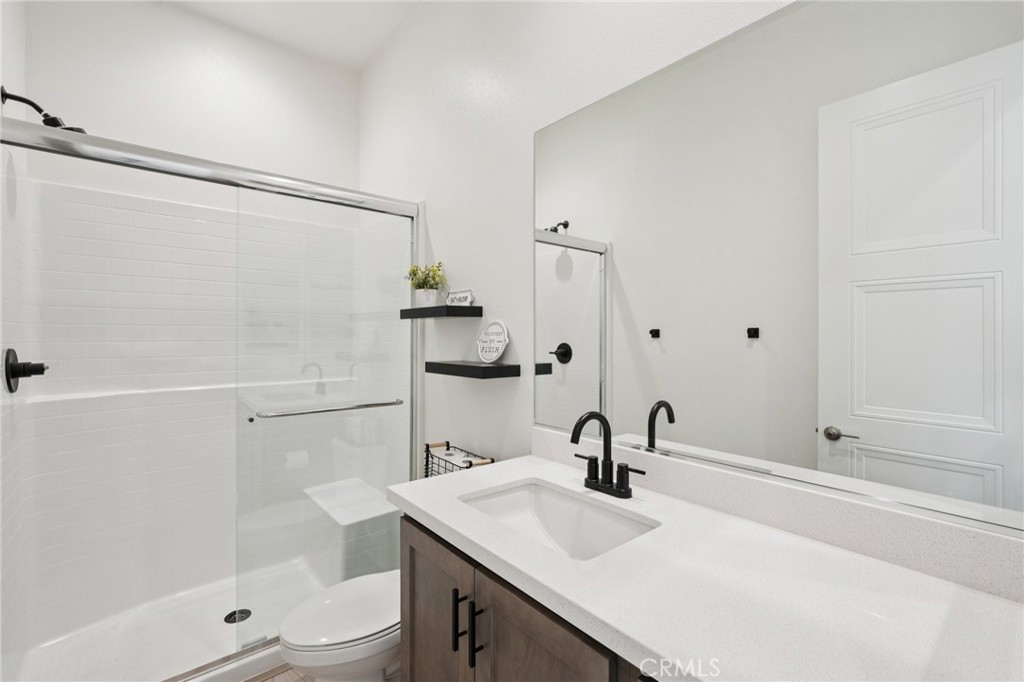 39481 Chamise Temecula, CA 92591 - Photo 20 of 34 a bathroom with a sink a toilet and shower