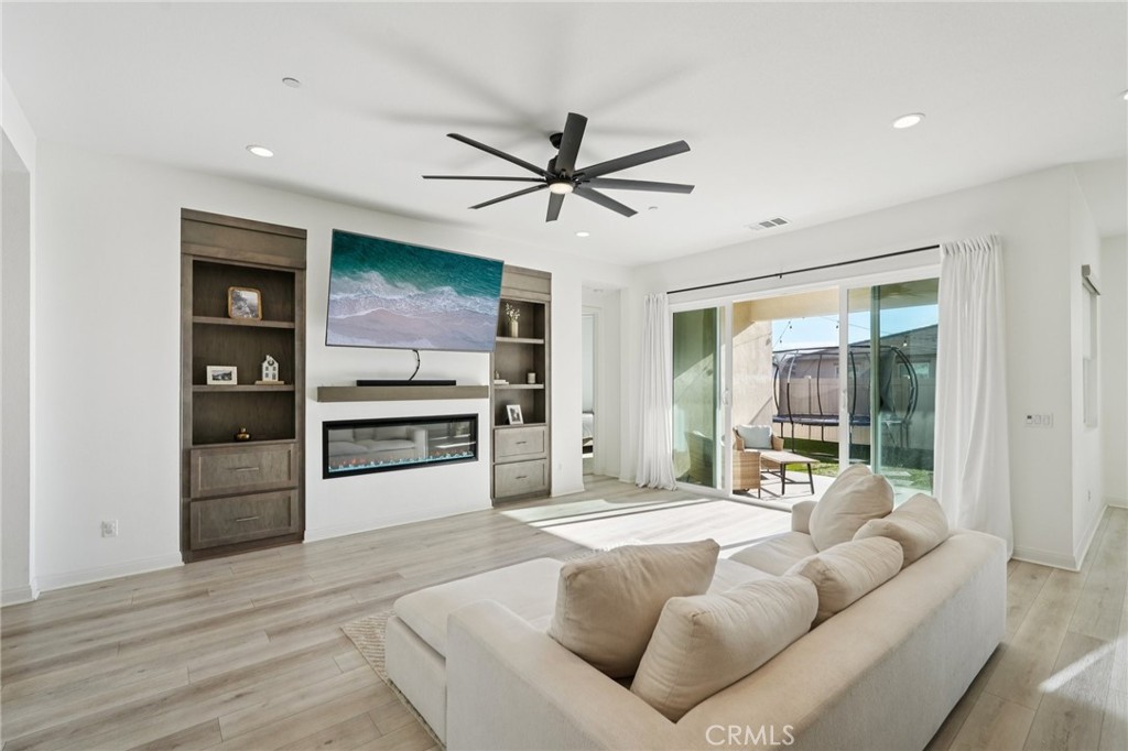 39481 Chamise Temecula, CA 92591 - Photo 3 of 34 a living room with furniture and a open kitchen view