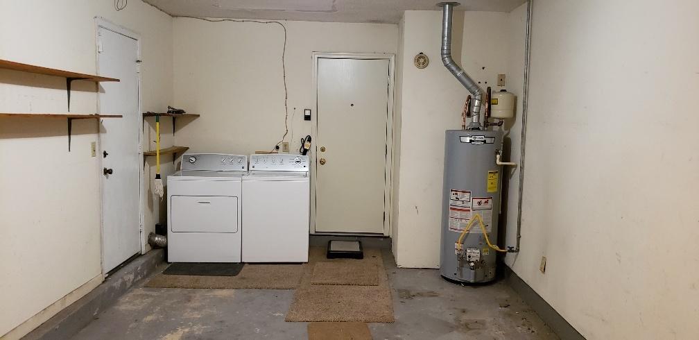 311 Pelham Road Fort Walton Beach, FL 32547 - Photo 21 of 22 Garage with Washer dryer H2O heater