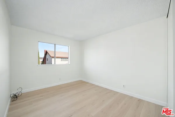 an empty room with a workspace