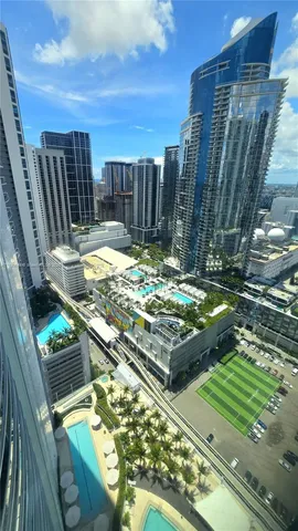 a view of a backyard with sitting area