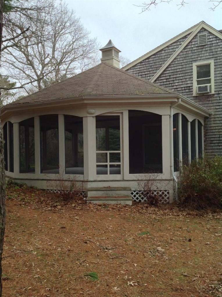 82 Pine Ridge Road Cotuit, MA 02635 - Photo 5 of 14 a front view of a house