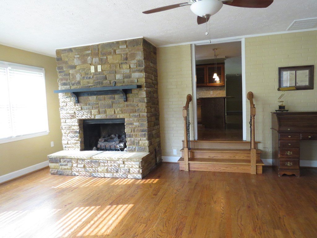 12747 Warm Springs Road Ellerslie, GA 31807 - Photo 2 of 23 Great room with gas log fireplace