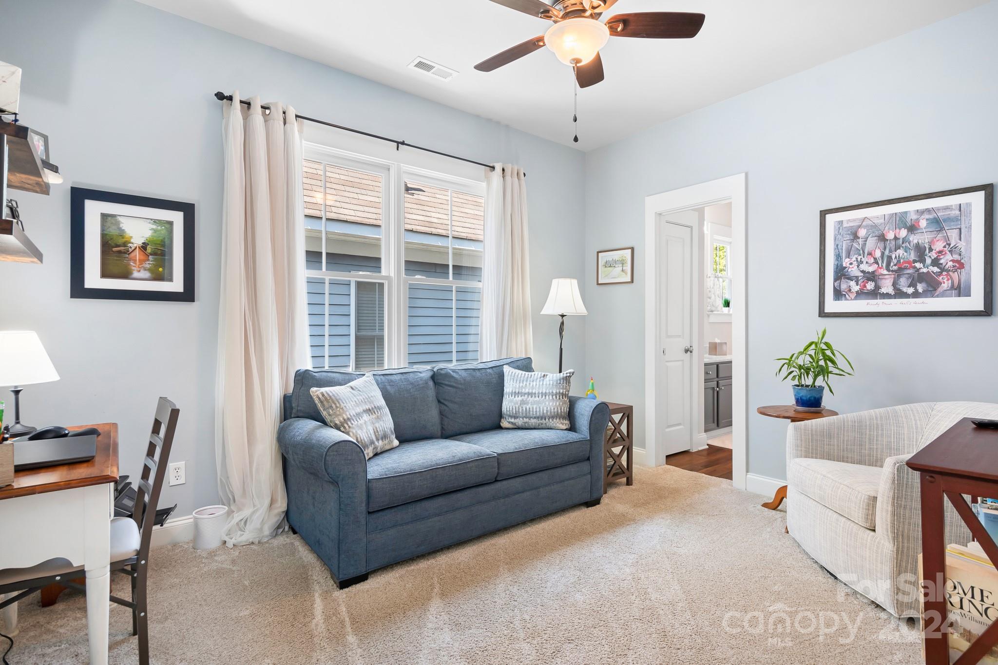 2607 Nations Commons Street Fort Mill, SC 29708 - Photo 20 of 40 a living room with furniture and a large window