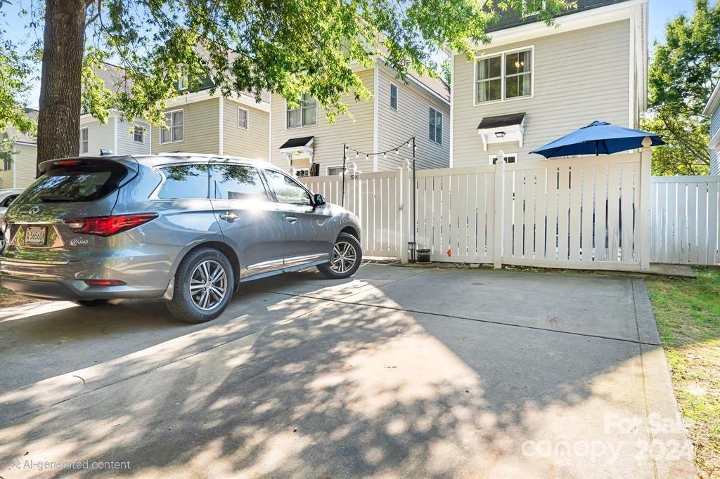 2607 Nations Commons Street Fort Mill, SC 29708 - Photo 23 of 40 a front view of a house with a garden and parking space