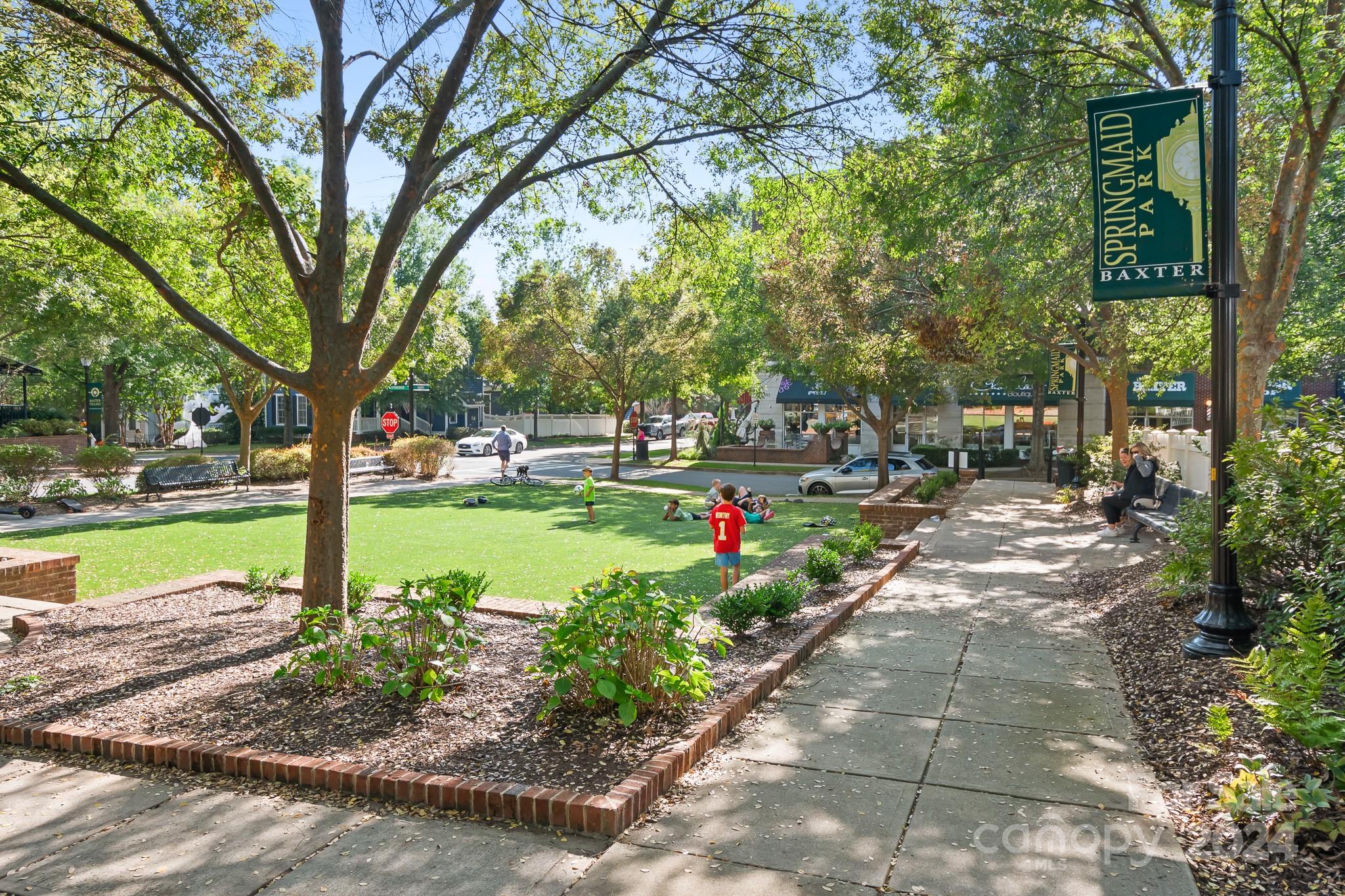 2607 Nations Commons Street Fort Mill, SC 29708 - Photo 26 of 40 a view of a garden with a bench