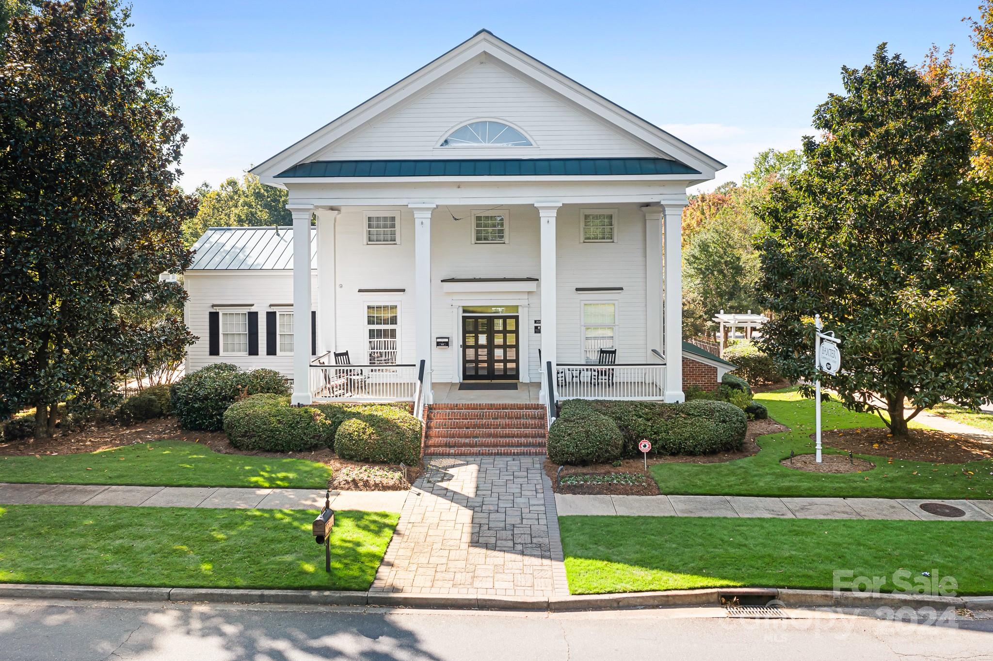 2607 Nations Commons Street Fort Mill, SC 29708 - Photo 34 of 40 a front view of a house with garden