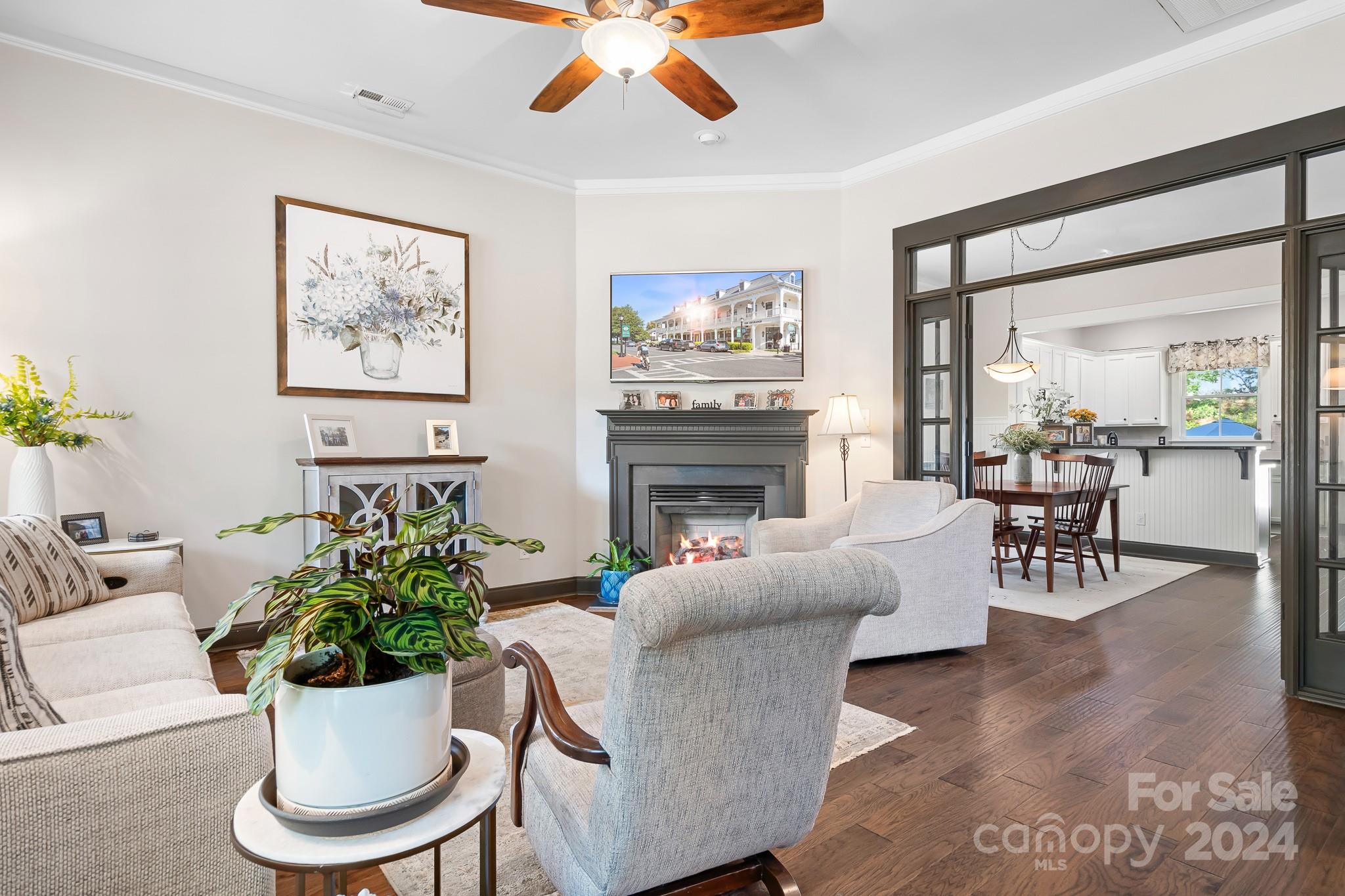 2607 Nations Commons Street Fort Mill, SC 29708 - Photo 8 of 40 a living room with furniture potted plant and a fireplace