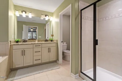 a backyard of a house with yard and outdoor seating