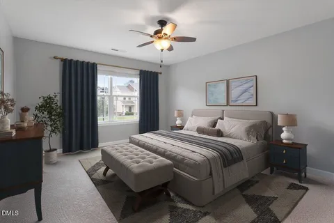 an aerial view of a swimming pool and outdoor space