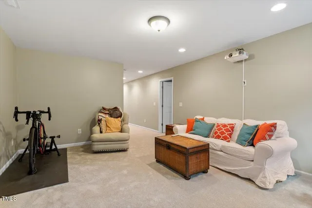 a view of a chair and table in the balcony