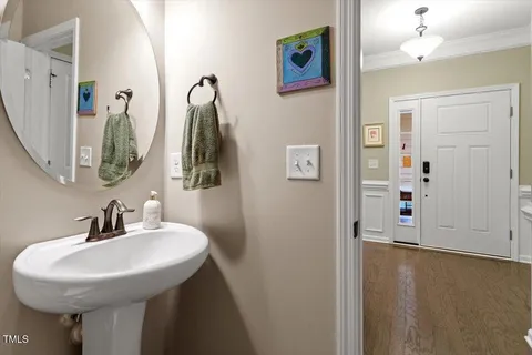 an aerial view of a house with outdoor seating