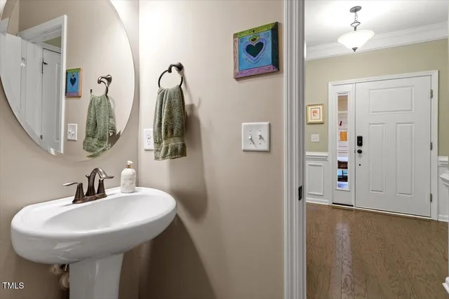 an aerial view of a house with outdoor seating