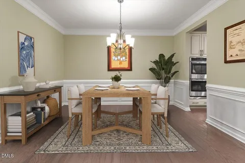 a kitchen with stainless steel appliances a refrigerator sink microwave and cabinets