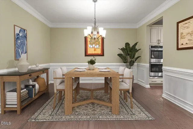 a kitchen with stainless steel appliances a refrigerator sink microwave and cabinets