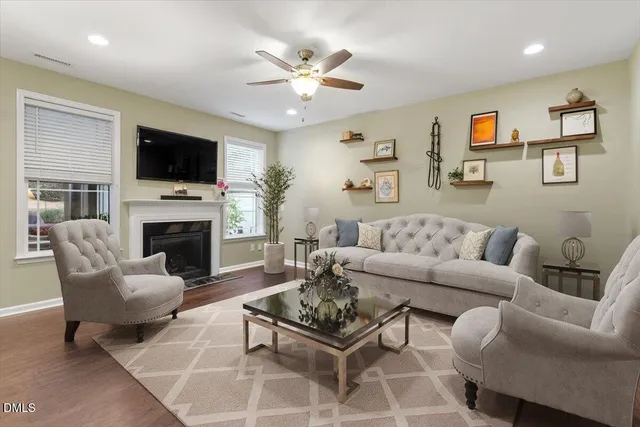 a kitchen with granite countertop a sink stainless steel appliances and cabinets