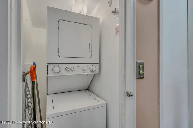 a view of bathroom with utility area