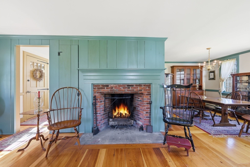 405 Rock Valley Road Holyoke, MA 01040 - Photo 11 of 42 a living room with furniture and a fireplace