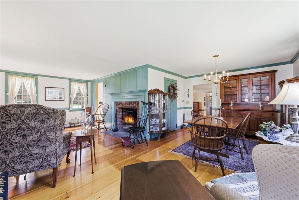 405 Rock Valley Road Holyoke, MA 01040 - Photo 14 of 42 a living room with furniture and a fireplace