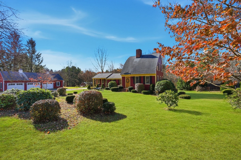 405 Rock Valley Road Holyoke, MA 01040 - Photo 2 of 42 a front view of a house with garden