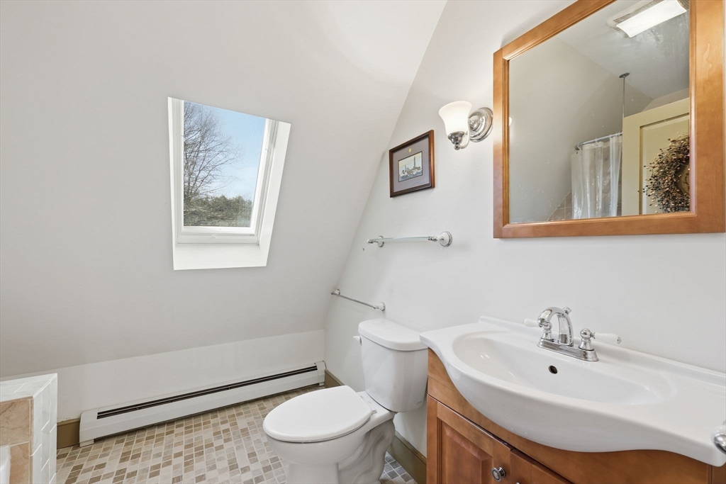 405 Rock Valley Road Holyoke, MA 01040 - Photo 27 of 42 a bathroom with a sink a toilet and shower