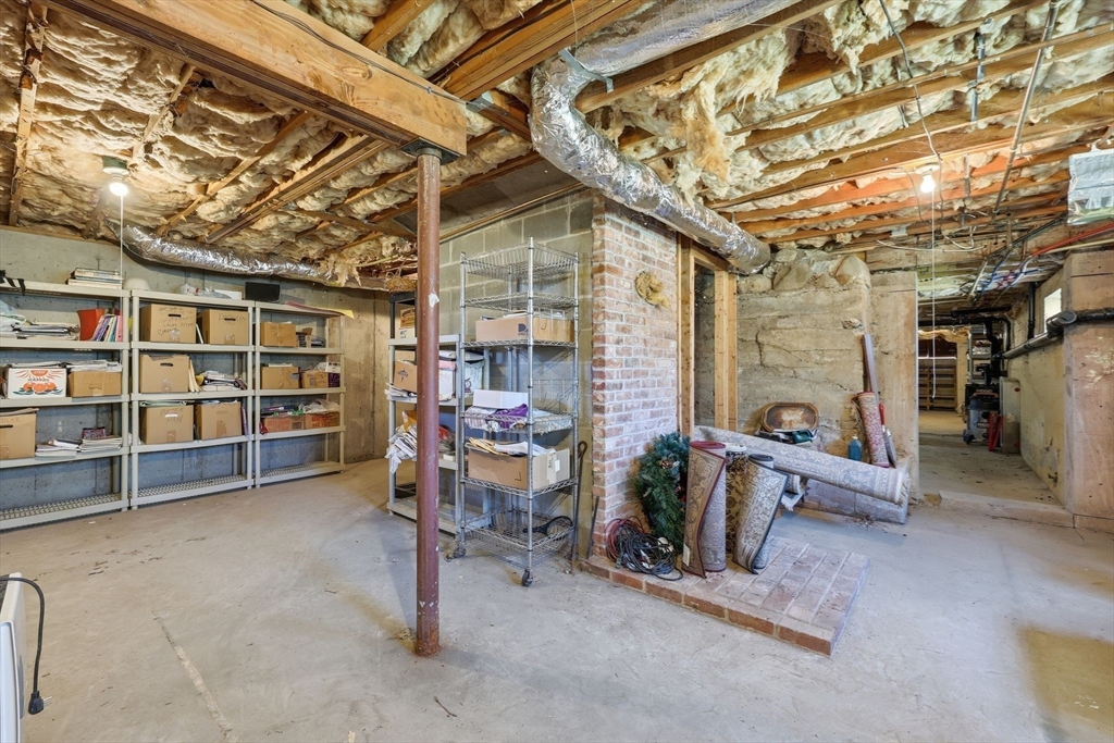 405 Rock Valley Road Holyoke, MA 01040 - Photo 28 of 42 a view of a livingroom with furniture and a garage