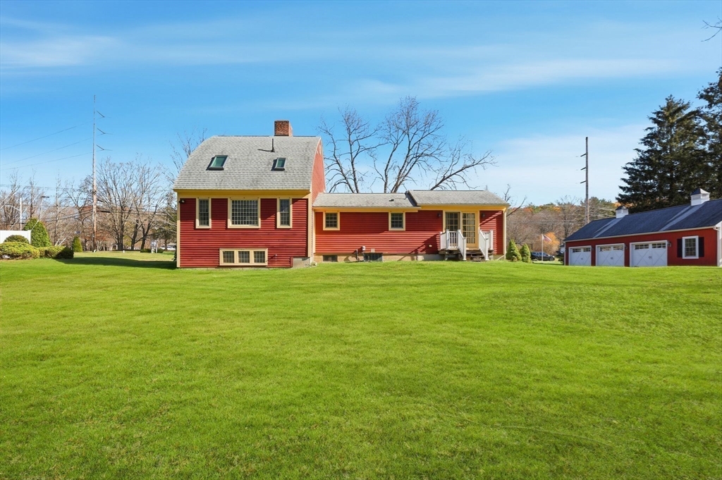 405 Rock Valley Road Holyoke, MA 01040 - Photo 29 of 42 a front view of house with garden