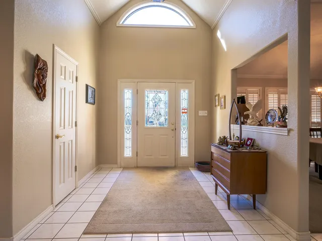a living room with a couch and a table