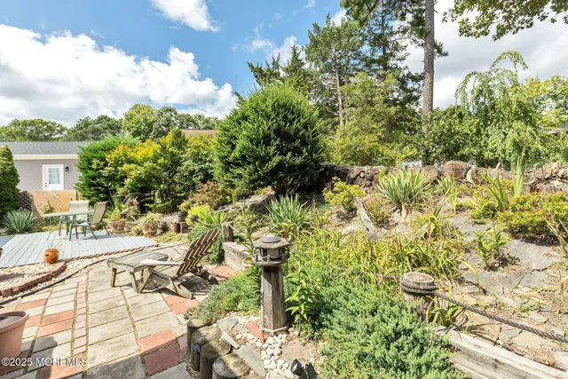 a view of yard with seating space