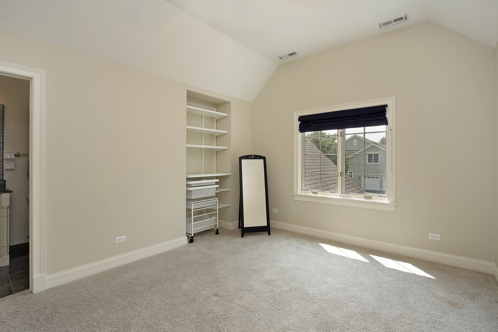 2215 Pinehurst Drive Glenview, IL 60025 - Photo 19 of 31 an empty room with a window and closet