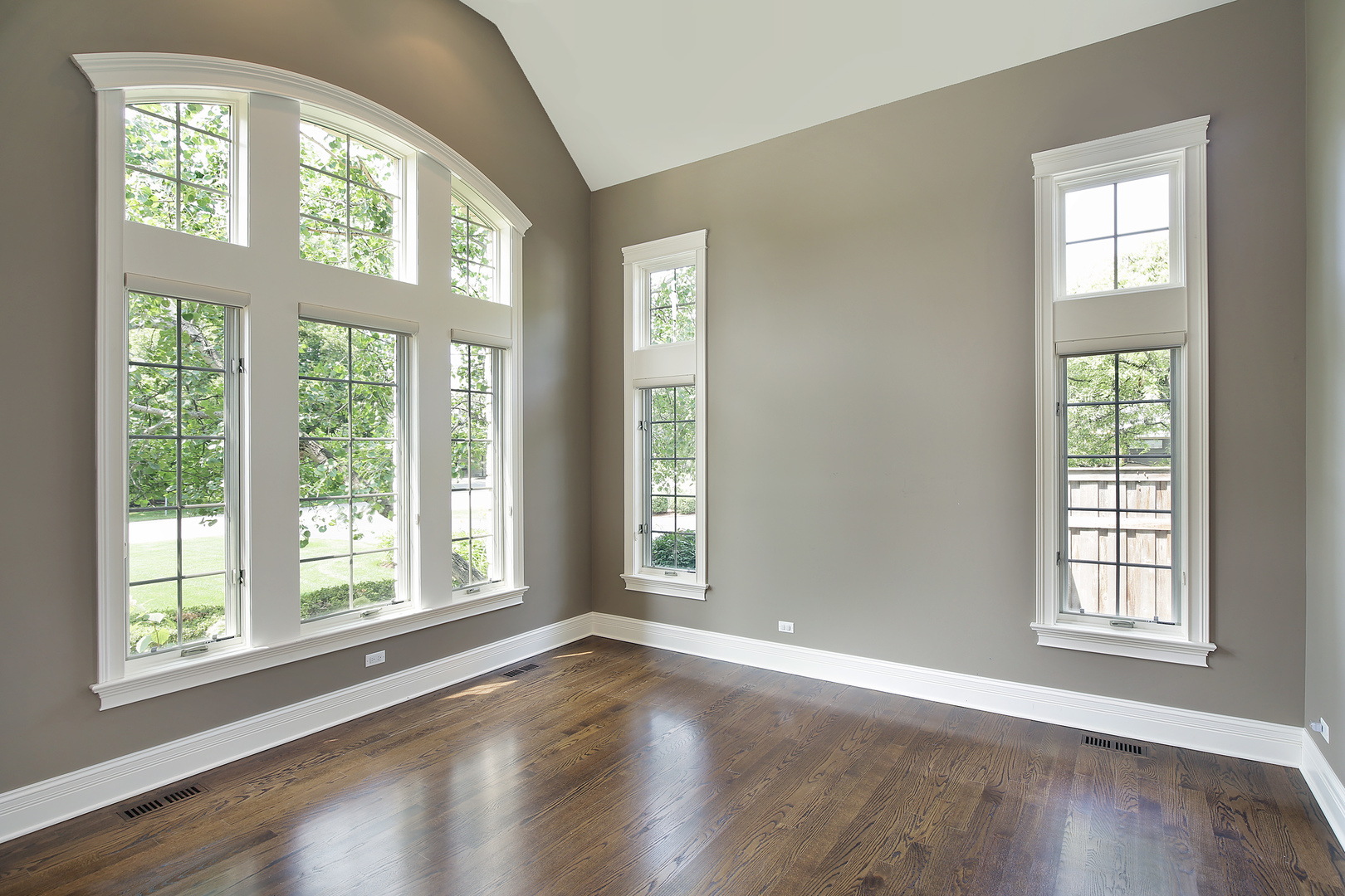 2215 Pinehurst Drive Glenview, IL 60025 - Photo 2 of 31 a view of an empty room with wooden floor and a window