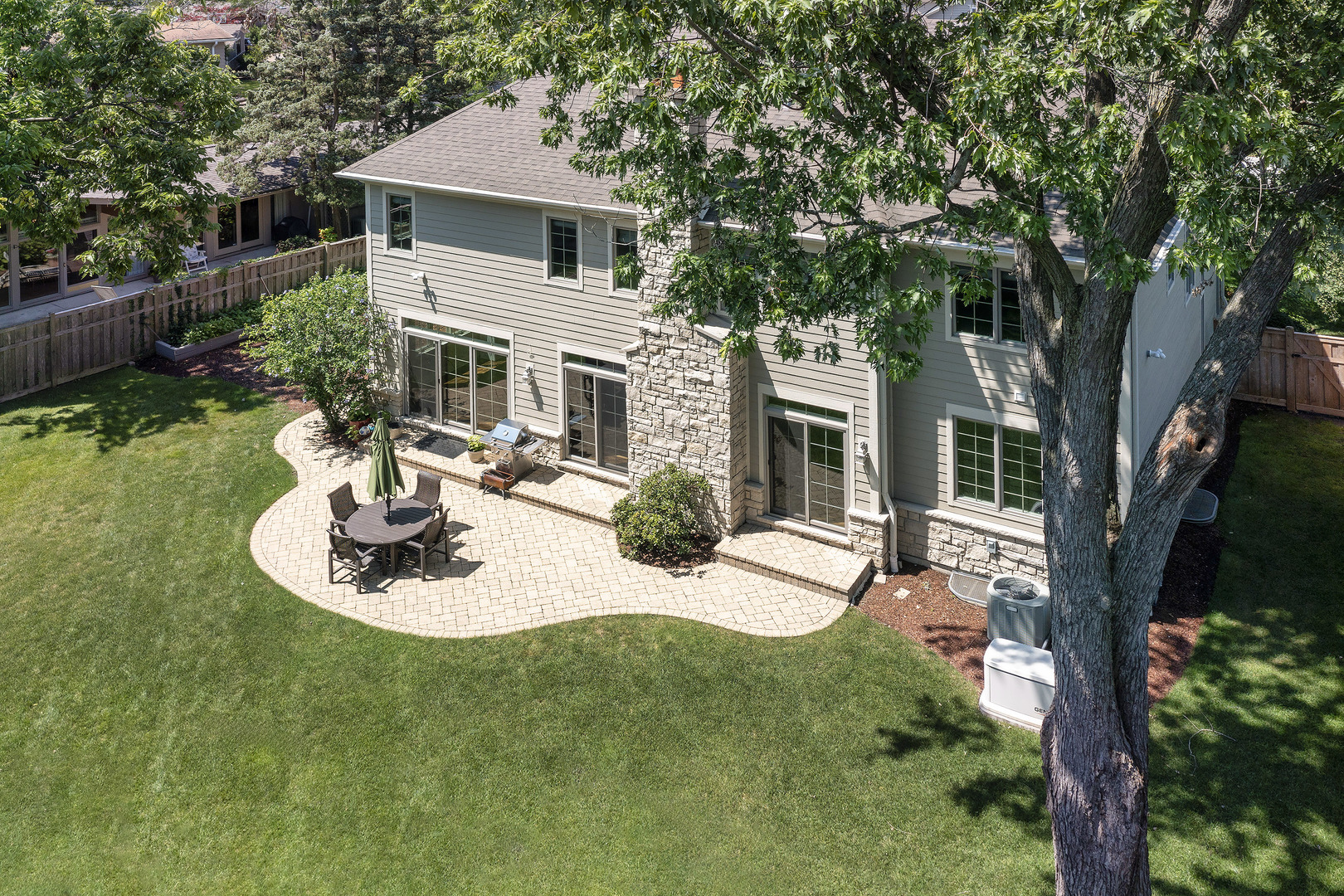 2215 Pinehurst Drive Glenview, IL 60025 - Photo 25 of 31 a view of a house with backyard and sitting area
