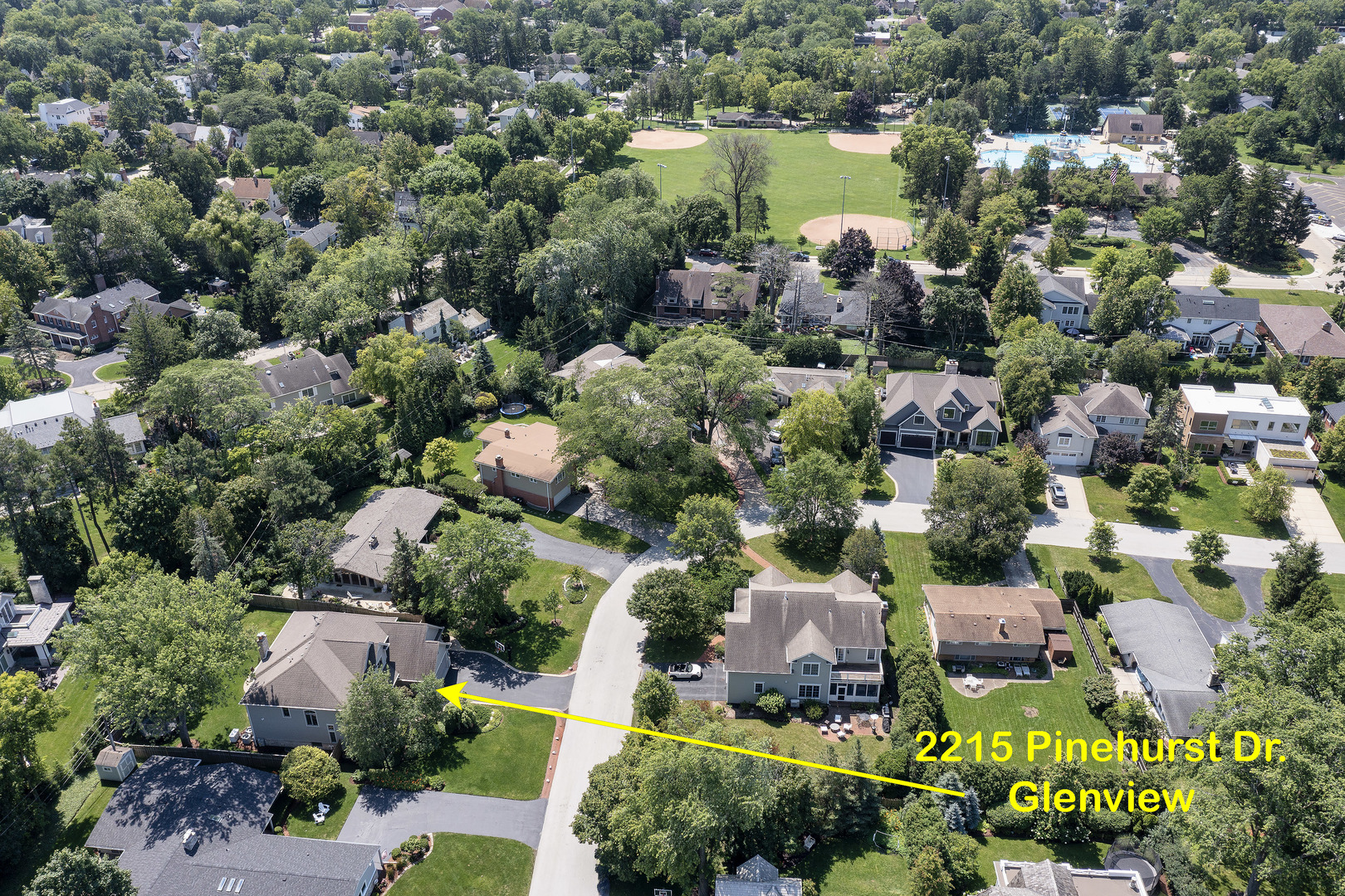 2215 Pinehurst Drive Glenview, IL 60025 - Photo 27 of 31 an aerial view of a house with a lake view
