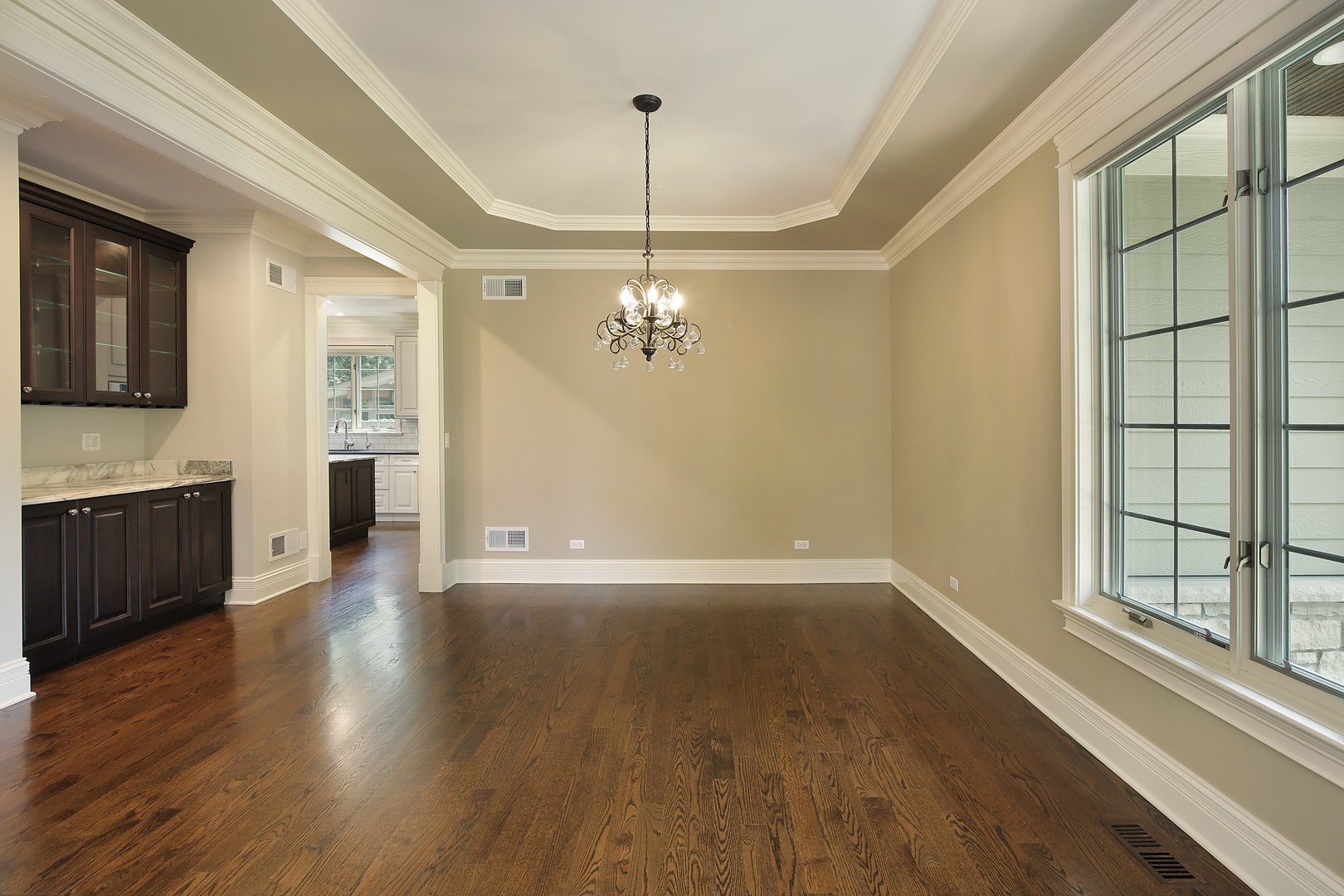 2215 Pinehurst Drive Glenview, IL 60025 - Photo 4 of 31 a view of a kitchen with wooden floor and a window