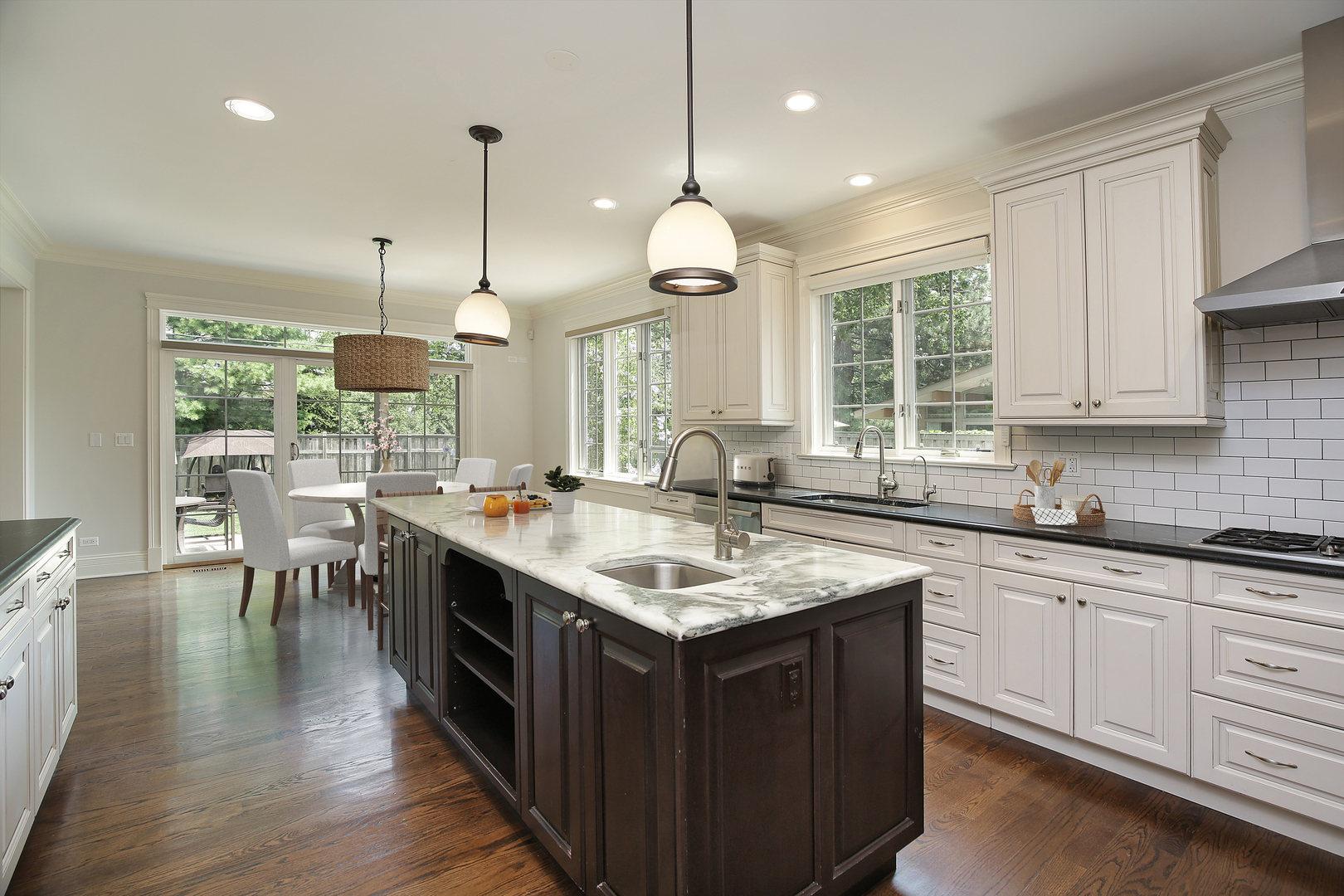 2215 Pinehurst Drive Glenview, IL 60025 - Photo 7 of 31 a kitchen with center island appliances and a large window